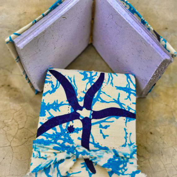 Blue-starfish-on-blue-batik-570x570